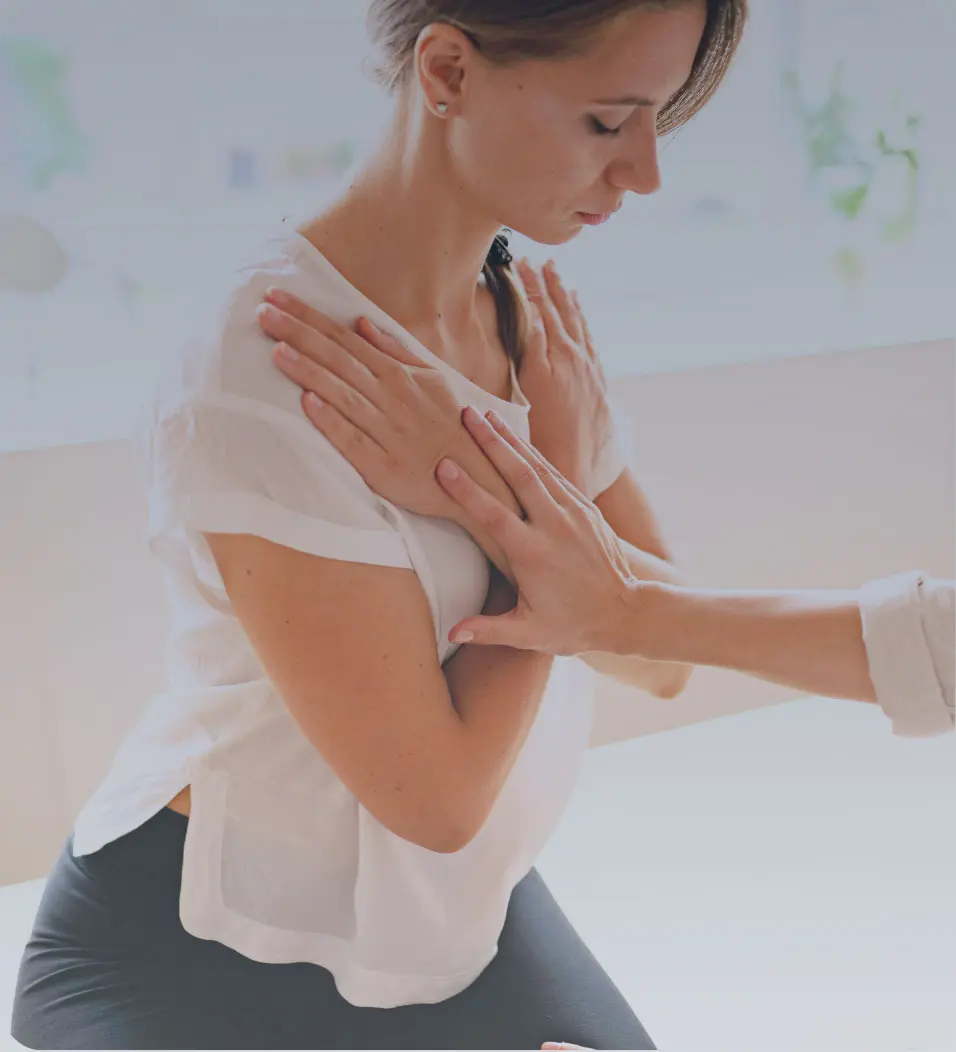 Client participating in somatic experiencing therapy for trauma healing and addiction recovery