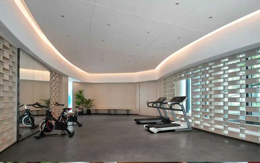 Modern wellness and fitness facility with exercise equipment for holistic addiction recovery and mental wellness programs